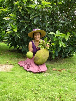 Noris Ledesma, curator of tropical fruit, with one of the new jackfruit cultivated at Fairchild.